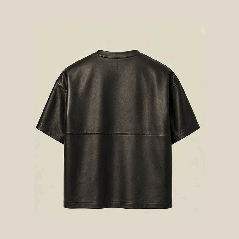 Back of men’s black leather crew-neck tee showing dropped shoulders and horizontal lower panel seam