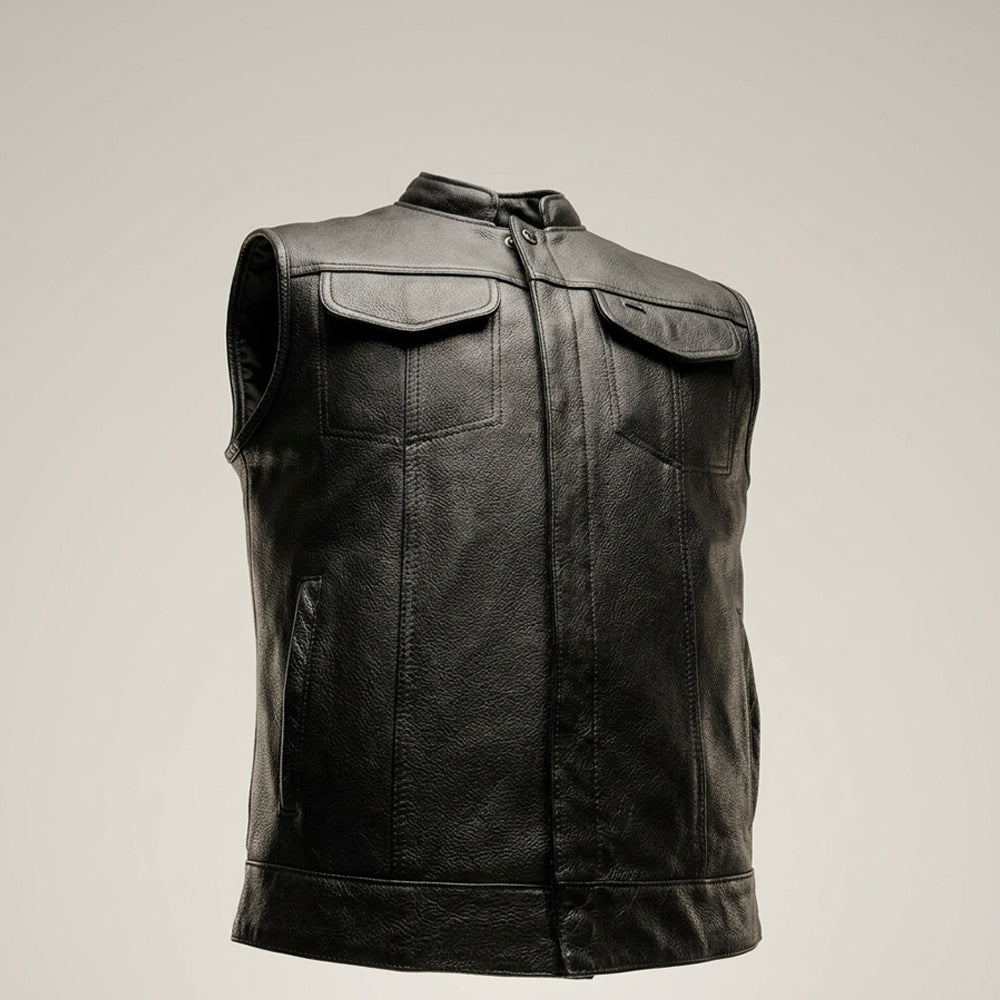 Angled front view of black leather utility vest highlighting structured panel seams, stand collar and reinforced hem