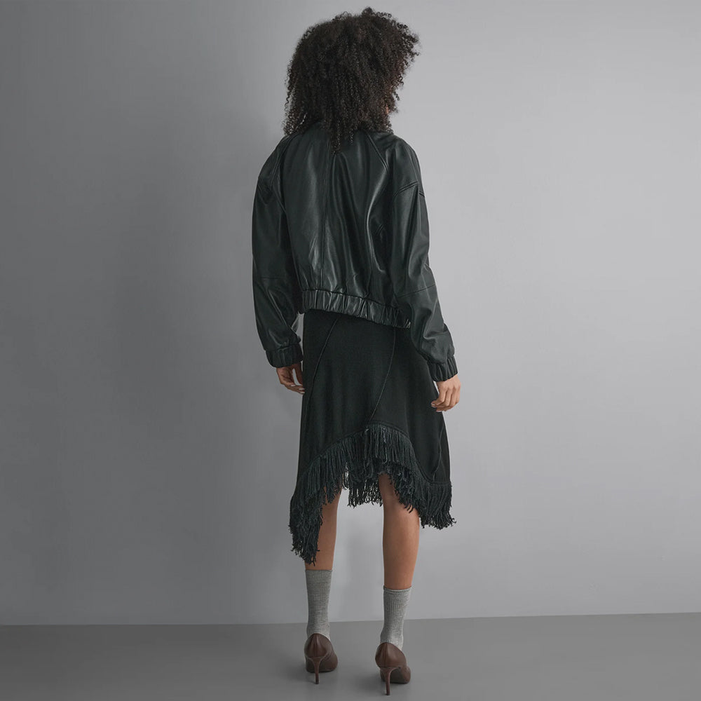 Rear view of a black sheep leather bomber showing the broad clean panel, dropped shoulder seams and elasticized cropped hem.