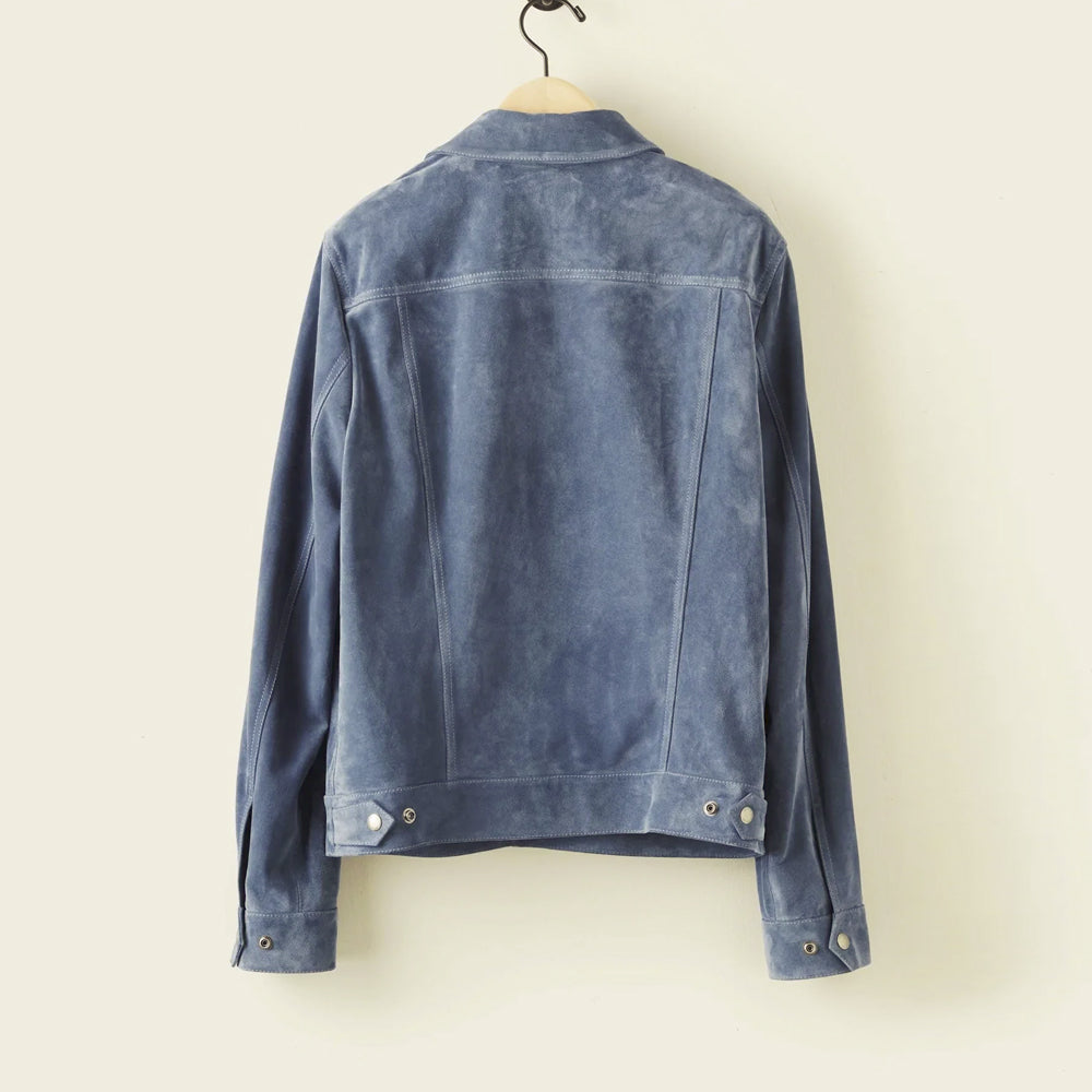 Back view of blue suede utility jacket showing shoulder yoke, vertical seams and adjustable hem tabs
