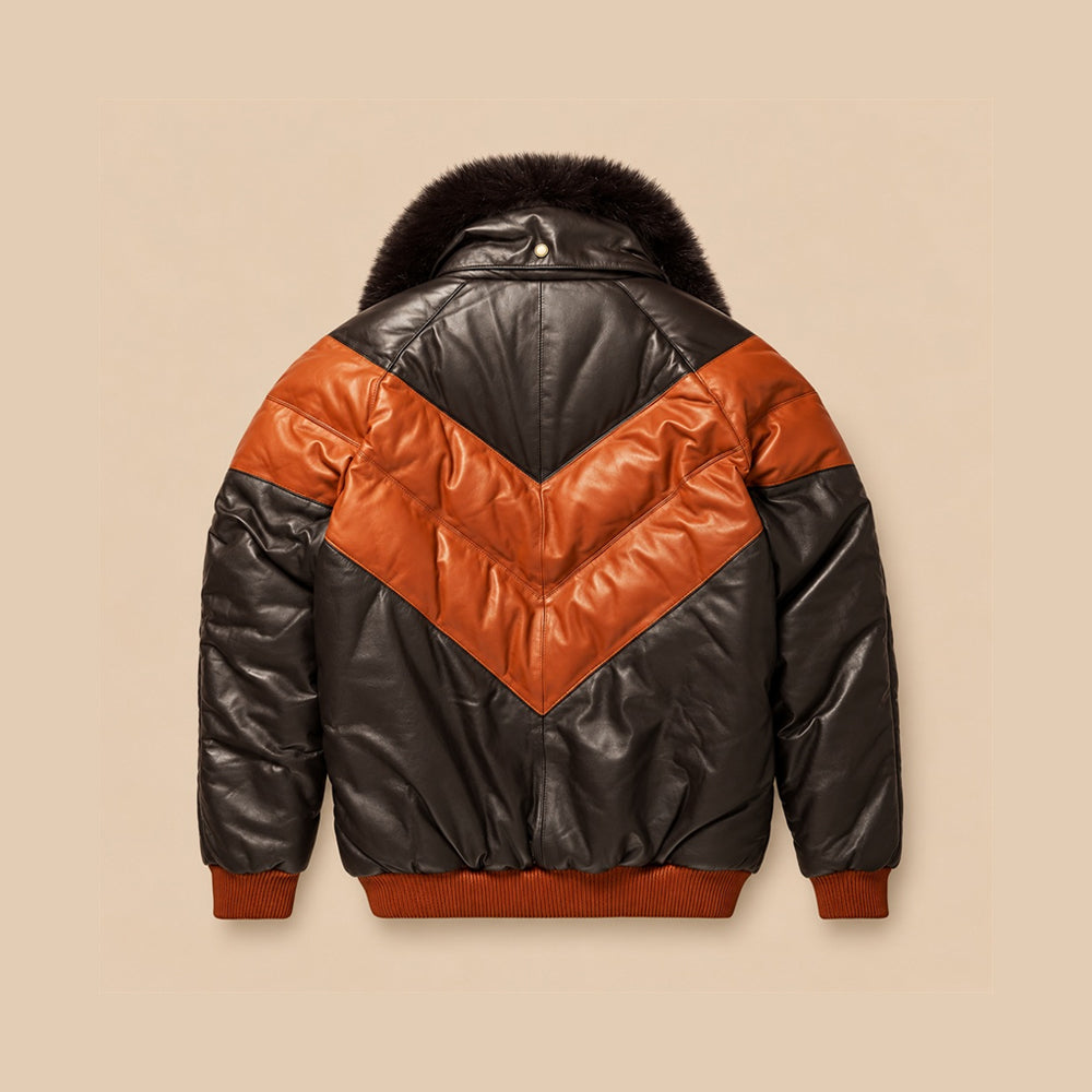 Back view of two-tone brown leather V-Bomber with cognac chevron panel, espresso pointed yoke, center seam and rust rib-knit hem.