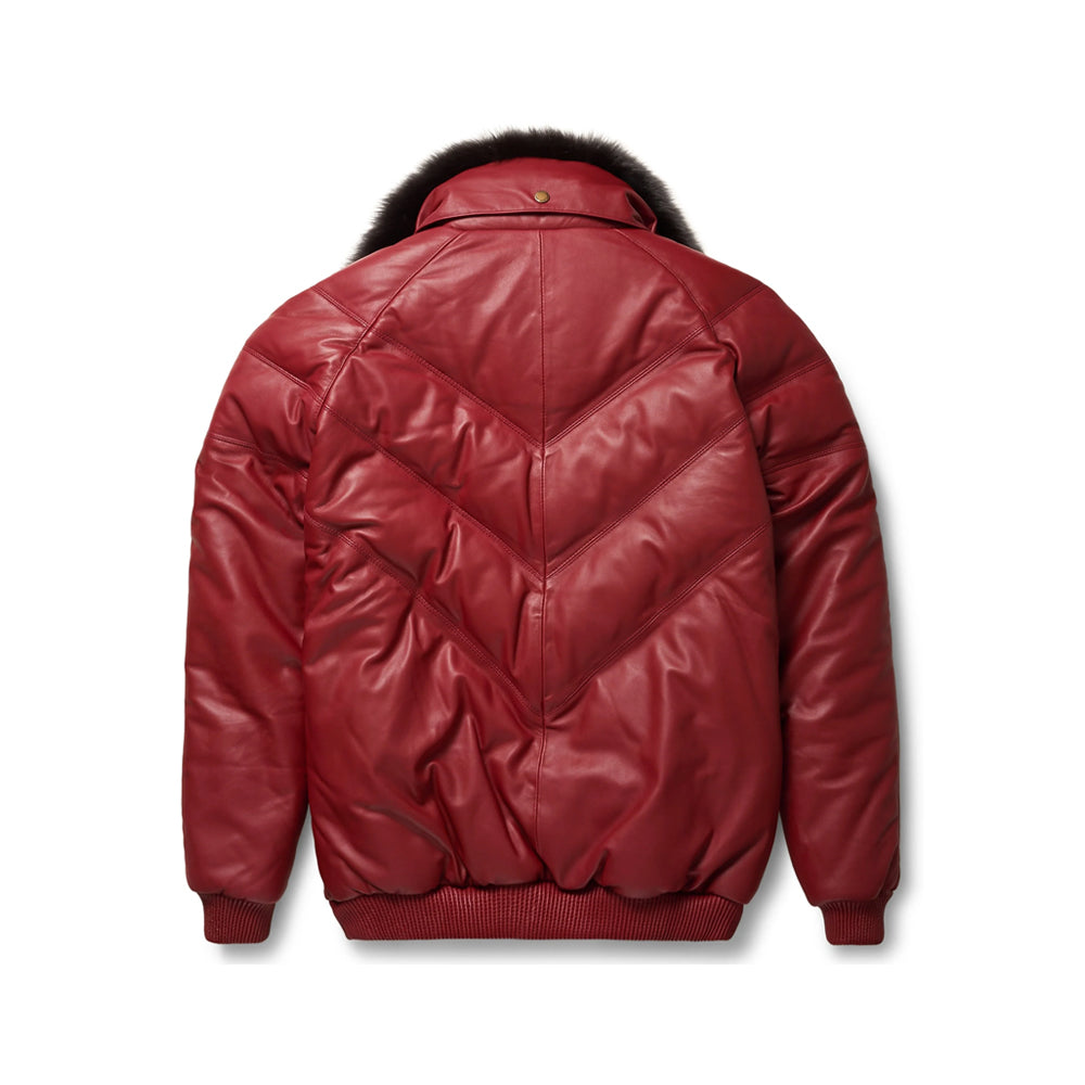 Back view of a burgundy leather puffer bomber with three nested V-shaped channels, padded sleeves and rib-knit waistband.