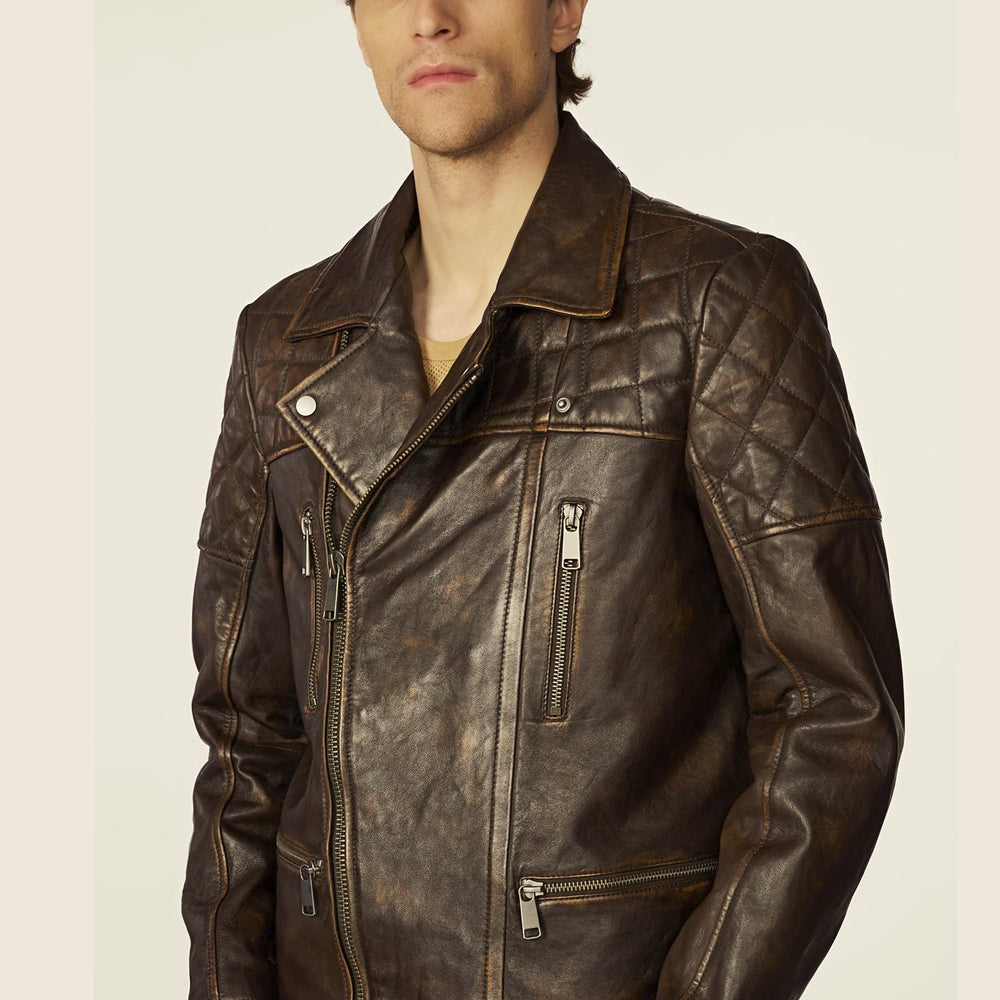 Close front view of chocolate sheepskin cross-zip jacket with diamond-quilted chest and four zipper pockets