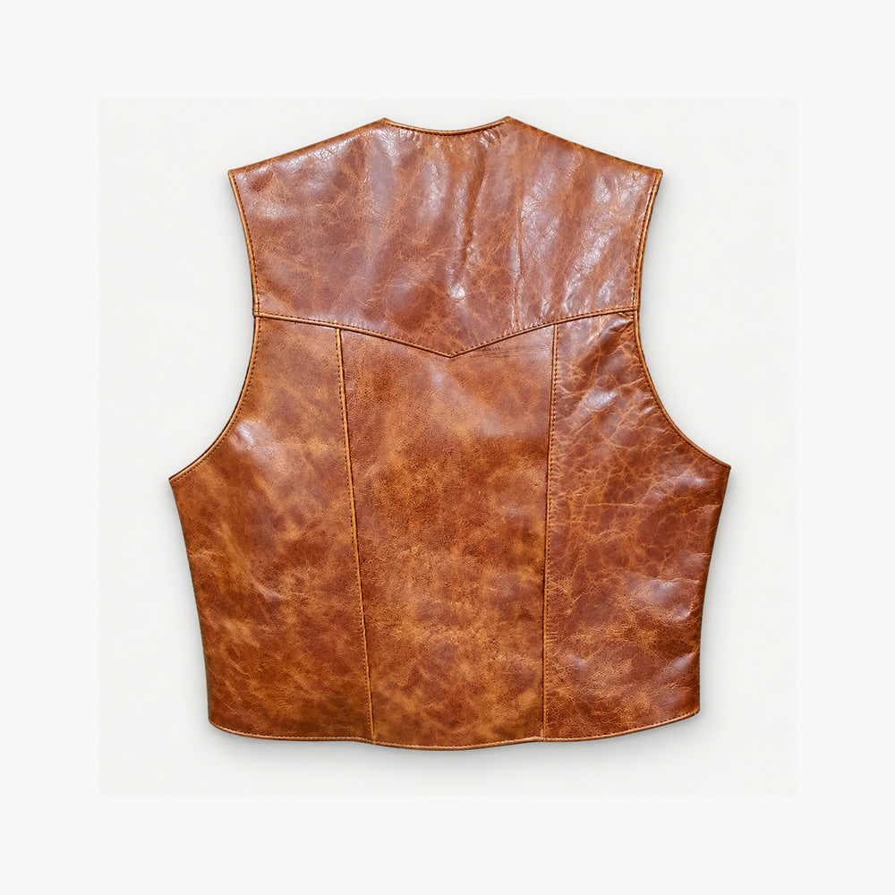 Rear view of cracker-leather cowboy waistcoat showing pointed Western yoke and three-panel back construction