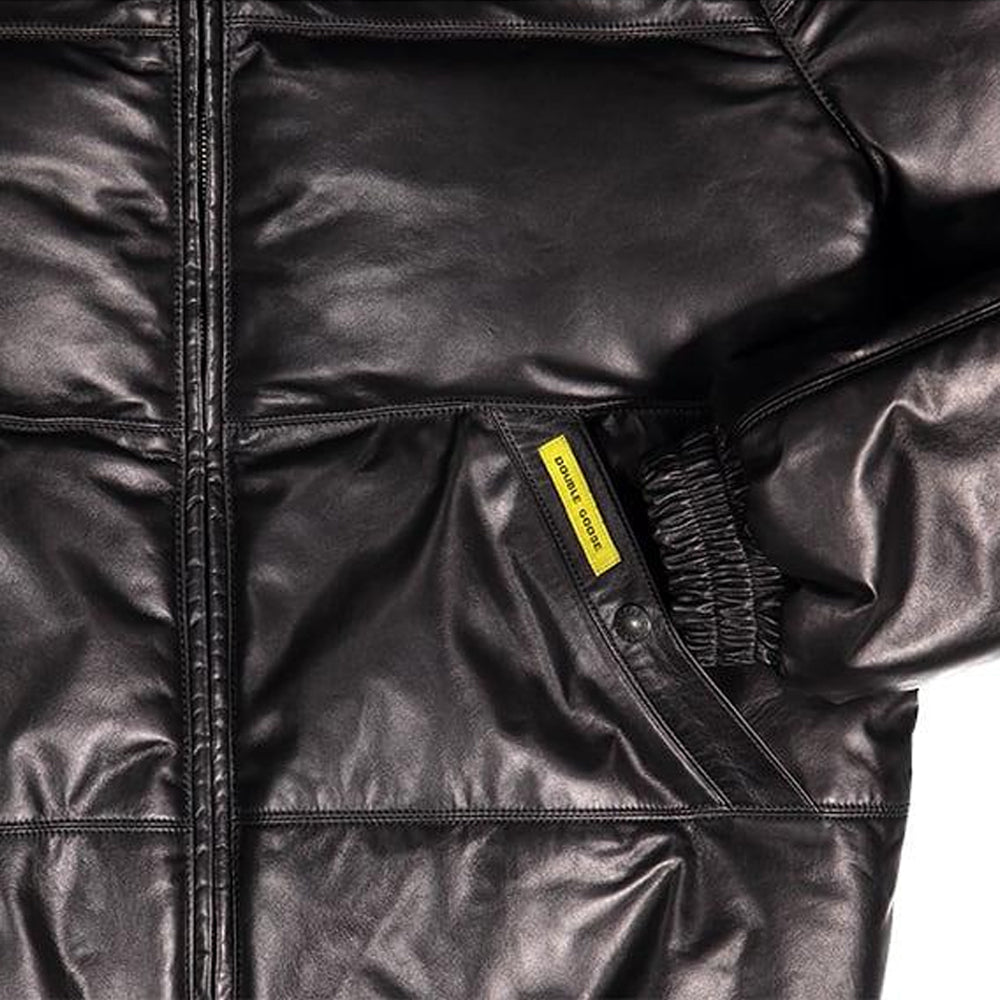 Angled black leather hand-warmer pocket with branded snap, yellow Double Goose tab and elasticized cuff.