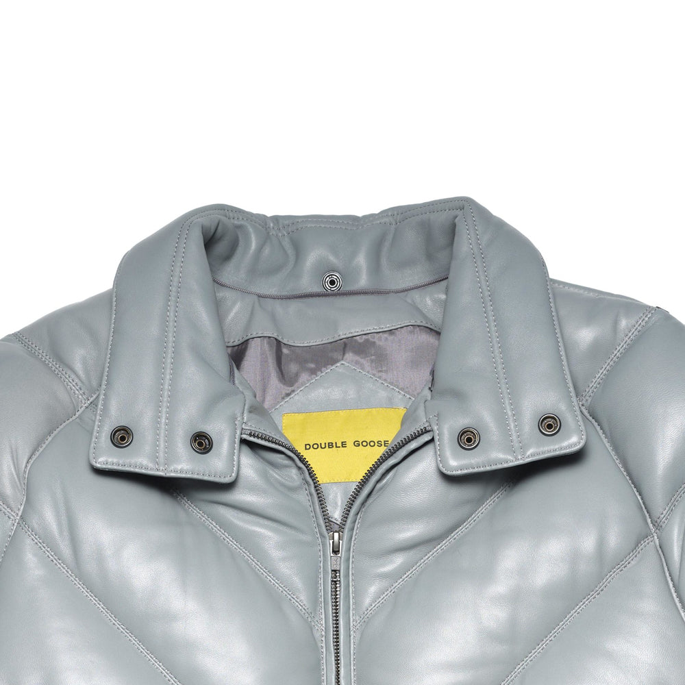 Close-up of light grey leather snap collar, tonal stitching, metal zipper and yellow Double Goose neck label