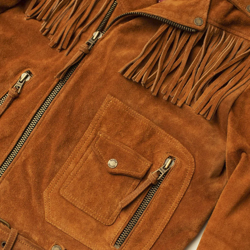 Close-up of chest fringe, YKK zipper and layered utility pocket on cognac goatskin suede