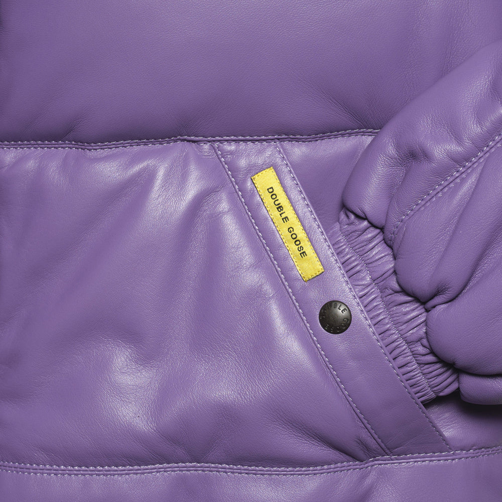 Angled lavender leather hand-warmer pocket with branded snap, yellow Double Goose tab and elasticated cuff.