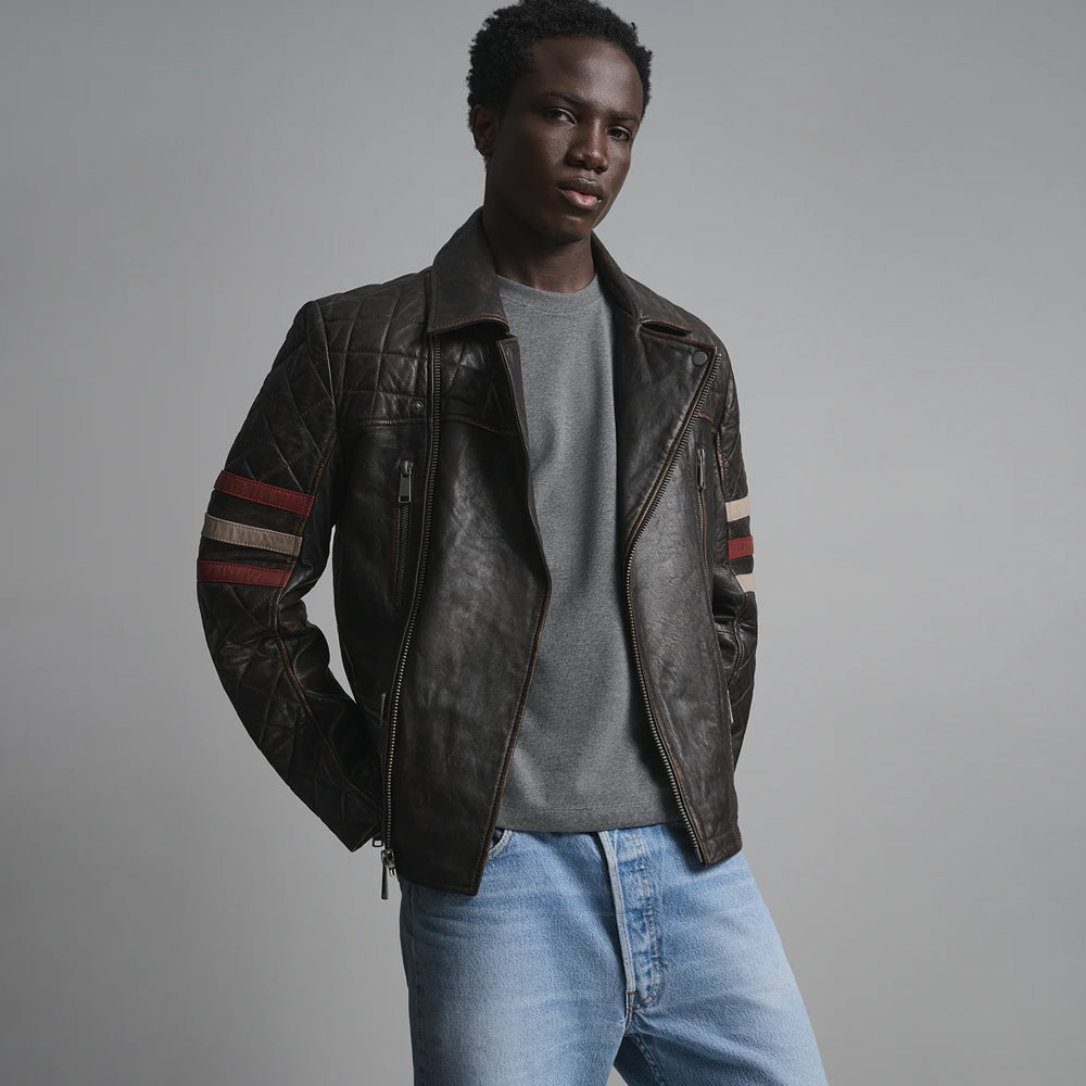 Men’s genuine leather motorcycle jacket worn open with snap notched lapels, vertical chest zippers and quilted arms