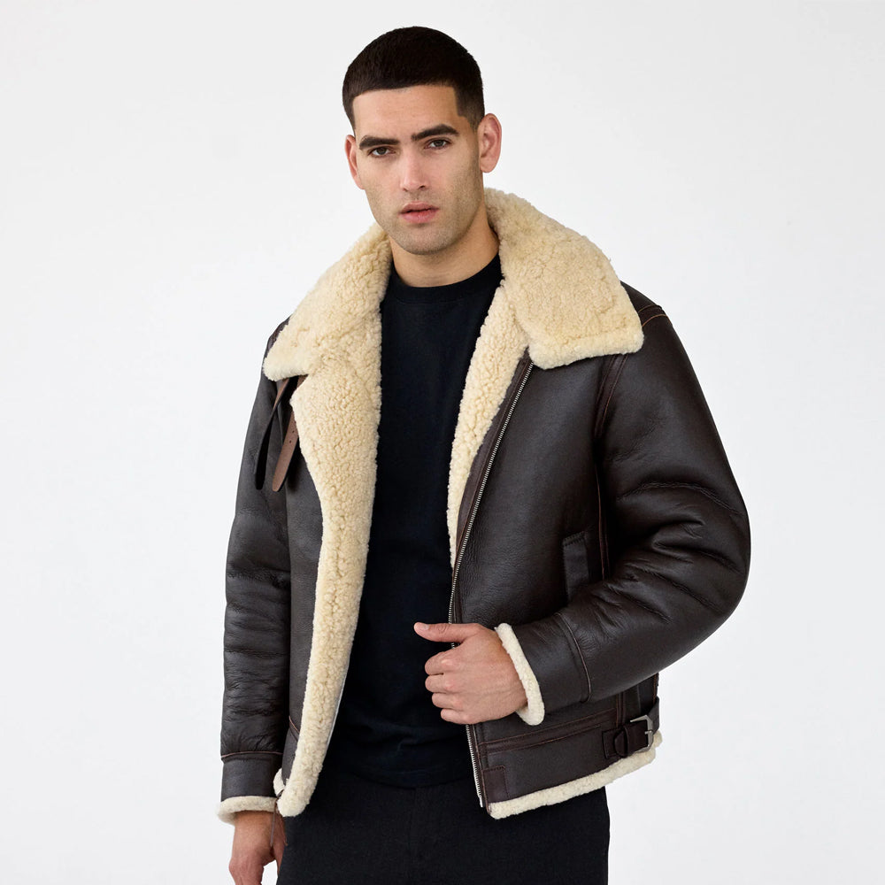 Open front view of a men’s B-3 leather aviator jacket showing its cream shearling lining.