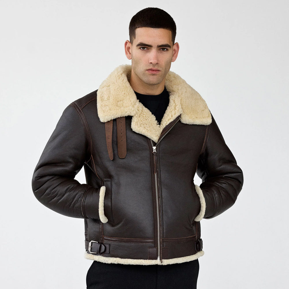 Front view of a man wearing a dark brown B-3 shearling aviator jacket with cream trim.