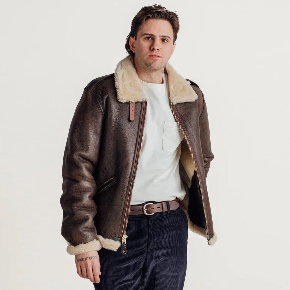 Man wearing a vintage brown men’s B-6 shearling aviator jacket