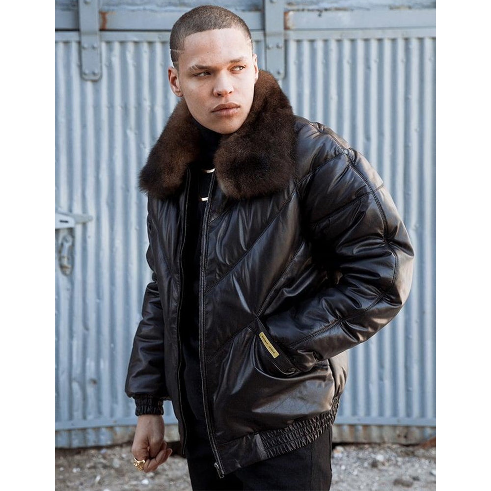 Men’s black calfskin V-bomber worn with dark opossum-fur collar, chevron padding and monochrome clothing