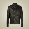 Front view of men’s black perforated leather utility shacket with silver-tone buttons and two flap chest pockets