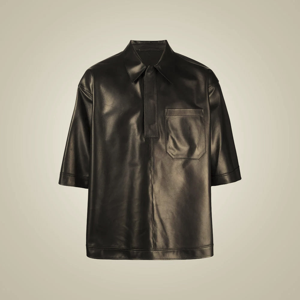 Front view of men’s black sheepskin leather popover shirt with pointed collar, hidden half placket and chest pocket