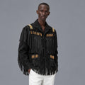 Model wearing men’s black Western fringe jacket with notched lapels, decorated pockets and layered shoulder tassels