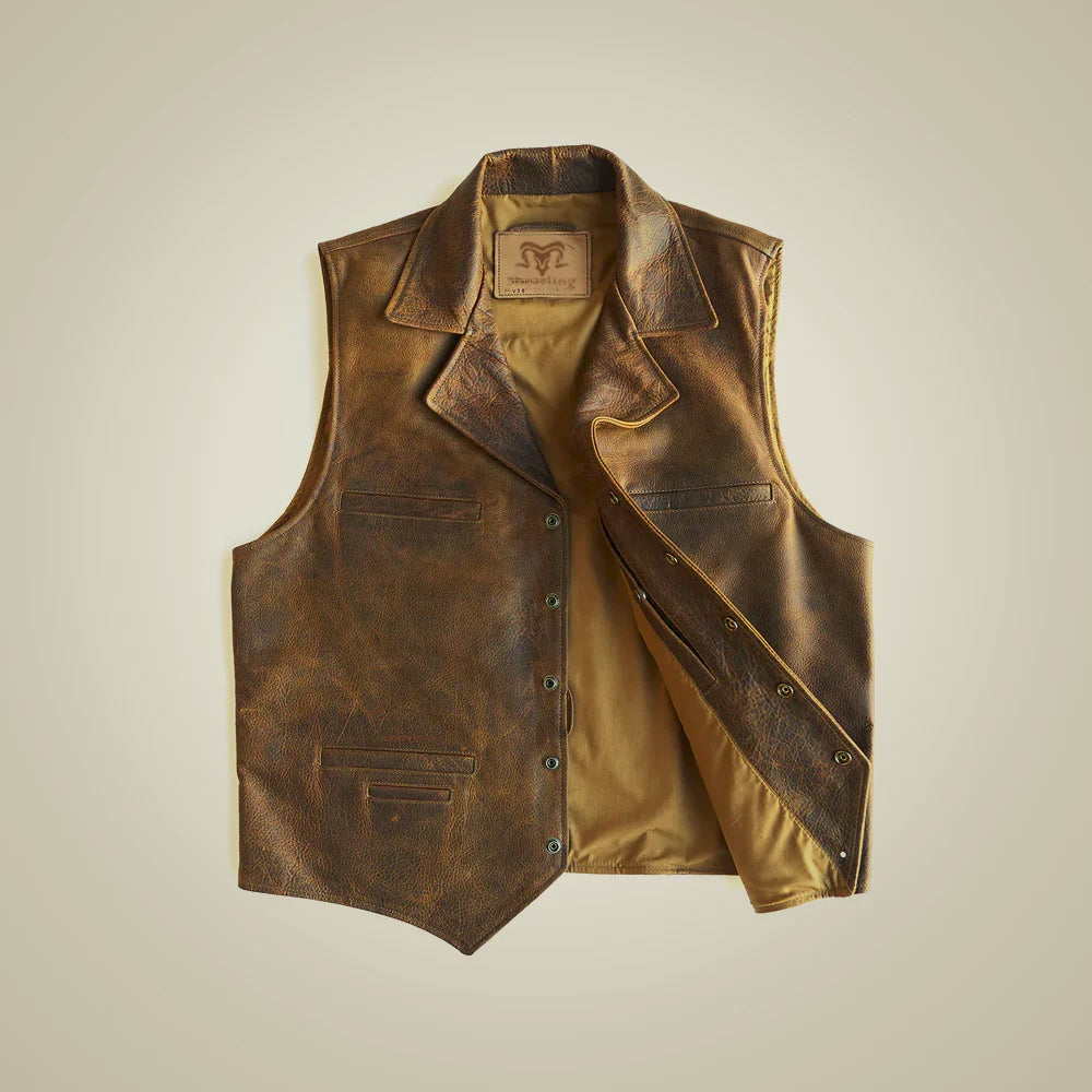 Front view of men’s brown cowhide Western vest with notch lapels, brass-tone snaps and multiple welt pockets