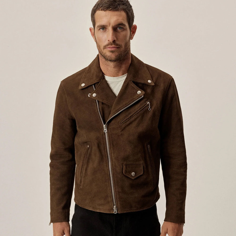 Man styling a brown suede double-rider jacket with silver zippers and snap lapels.