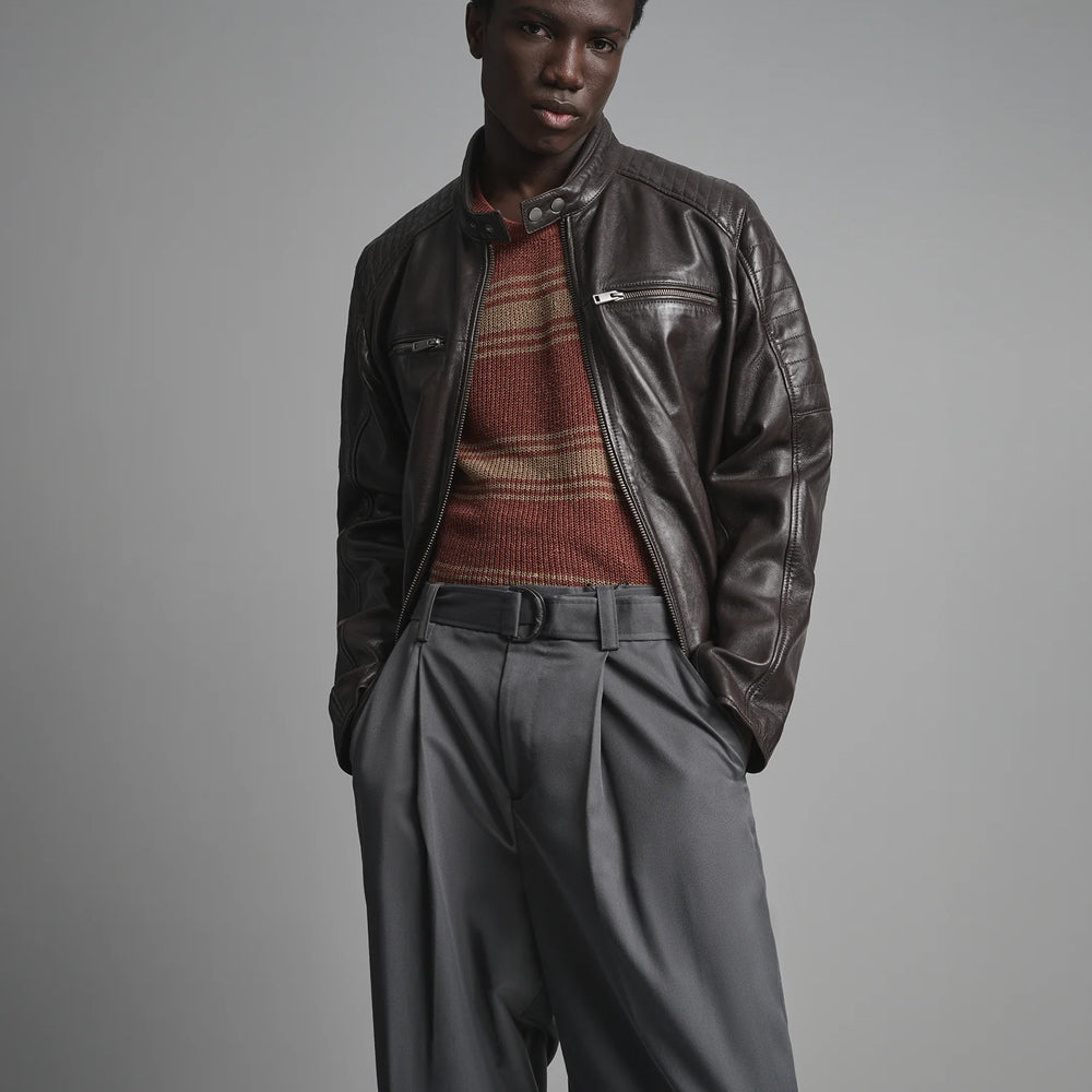 Three-quarter view of men’s channel-quilted leather racer with espresso finish, open collar and shaped sleeves
