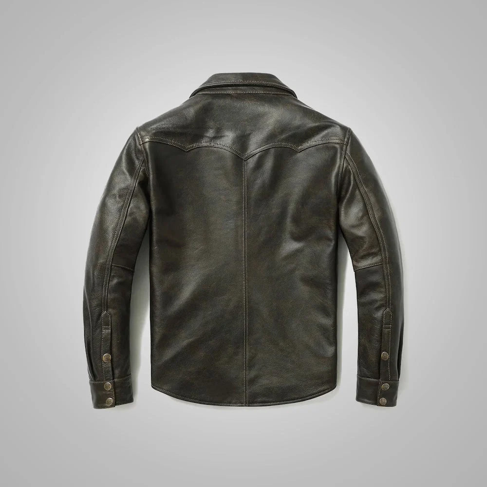 Back view of men’s dark green leather overshirt with pointed Western yoke, center seam and curved hem