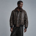 Men’s distressed lambskin A-2 flight jacket front with chocolate shearling collar and snap-flap patch pockets