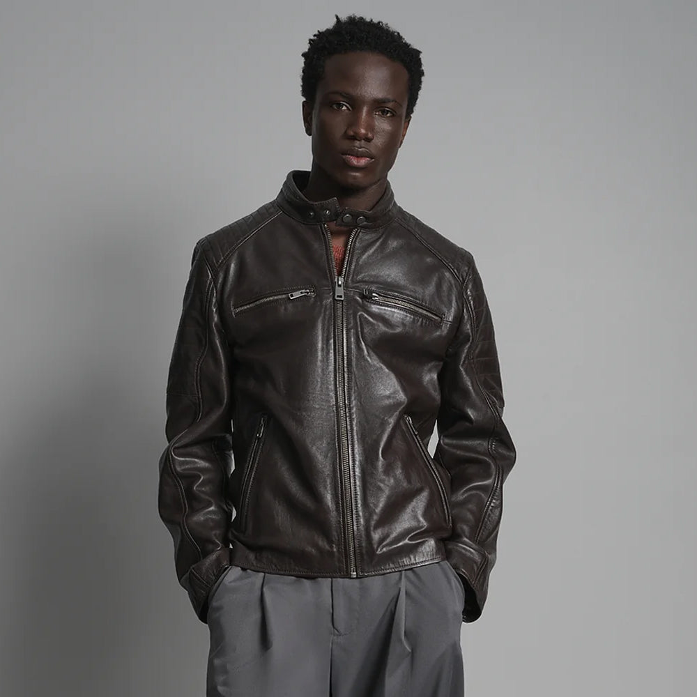 Front view of men’s espresso leather café racer jacket with snap-tab collar, four zip pockets and quilted shoulders