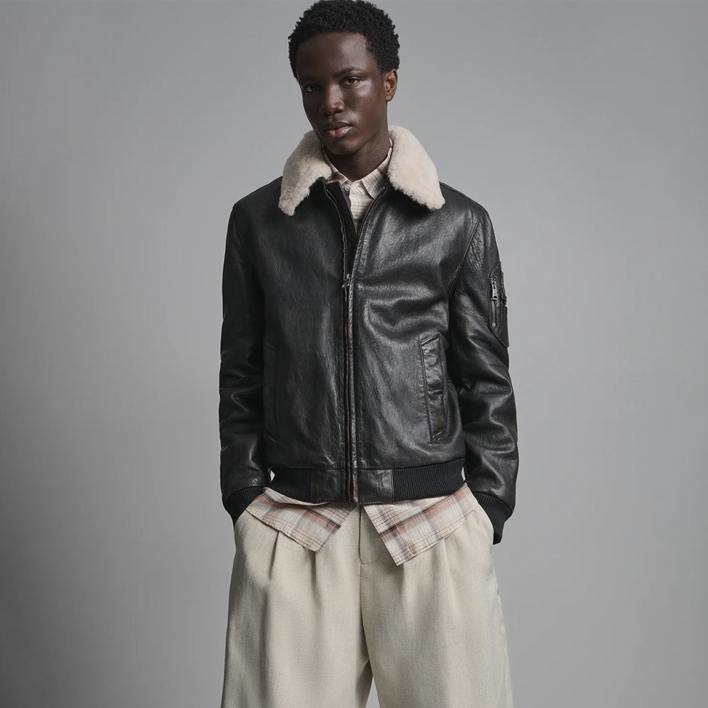 Men’s G-1-inspired black jacket with contrasting ivory neckline, straight zipper and knitted waist trim