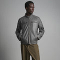 Front view of men’s graphite leather moto jacket with dual-snap collar, horizontal chest zippers and quilted shoulders
