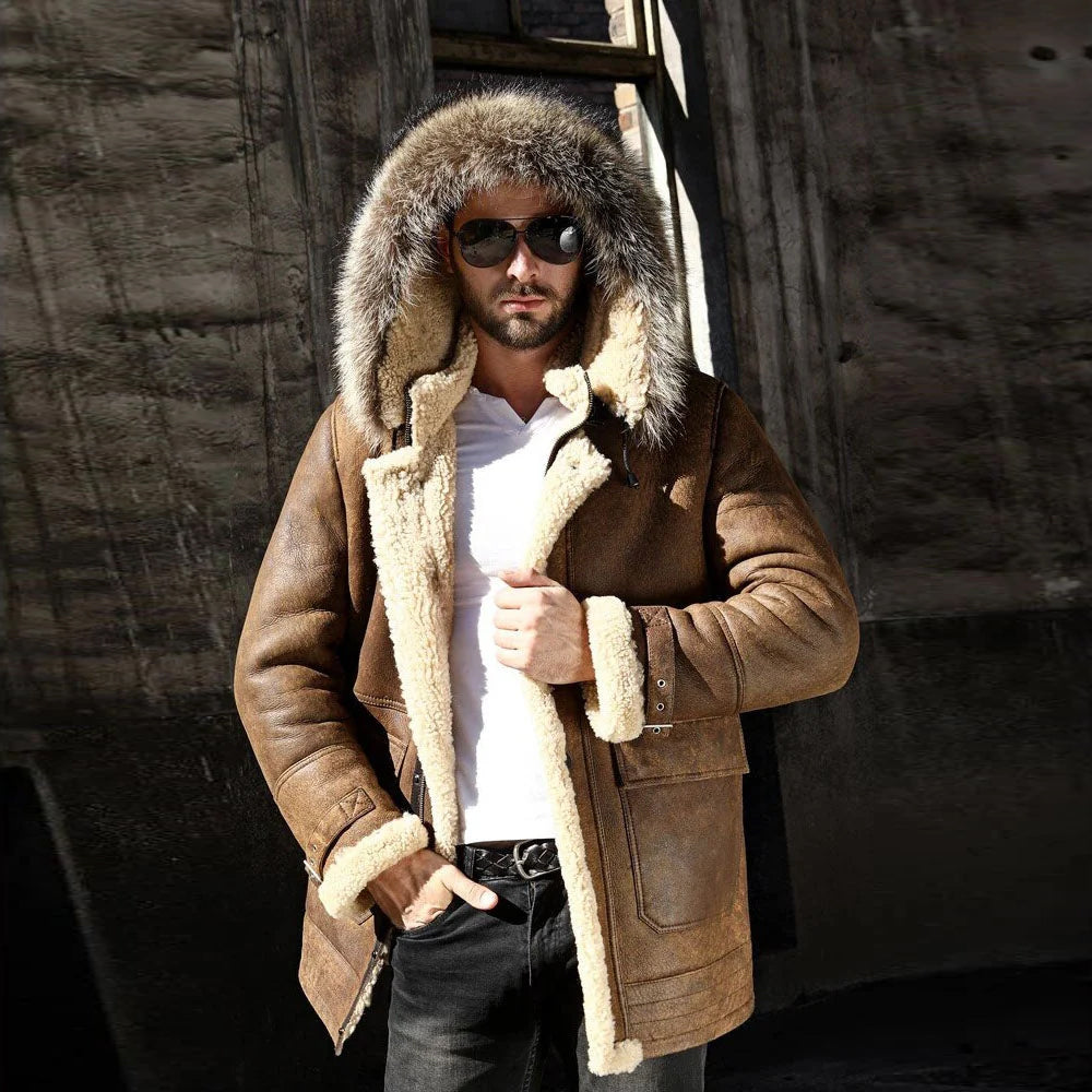 Front view of a man wearing a tan hooded sheepskin coat with cream shearling lining.