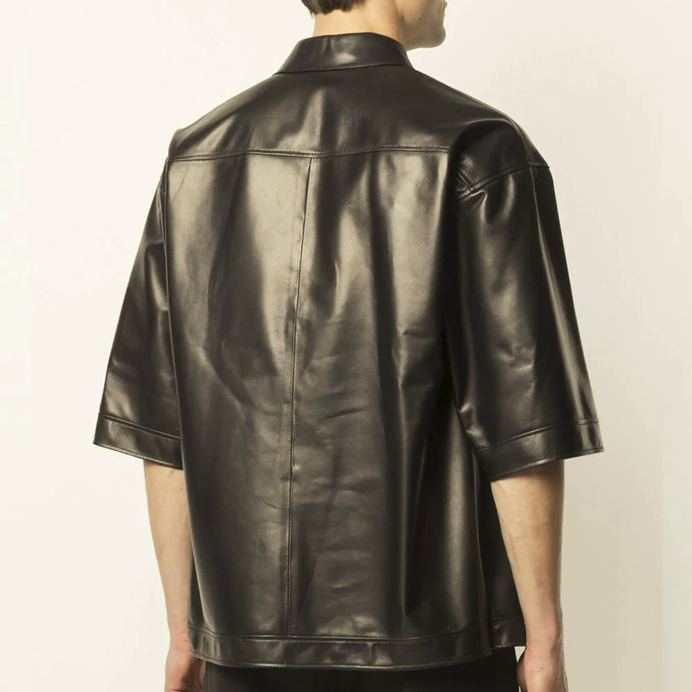 Rear view of men’s leather popover shirt with horizontal back yoke, center panel seam and wide half sleeves