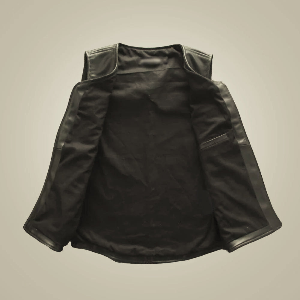 Open men’s moto leather vest showing soft black lining, inner zip pocket and finished leather edges