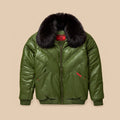 Front view of men’s olive lambskin leather V-Bomber with tonal chevron panels and a removable black fox fur collar.