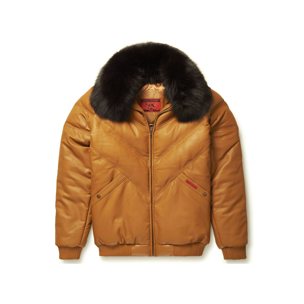 Front view of men’s Original Goose Country cognac leather V-bomber with black fox-fur collar and red pocket logo