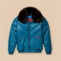 Men’s Original Goose Country teal lambskin leather V-Bomber with tonal chevron panels and removable black fox-fur collar.