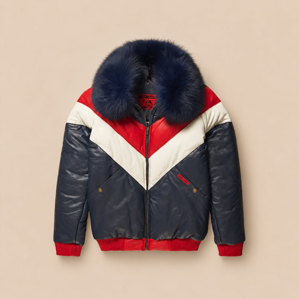 Front view of men's tri-color leather V-bomber jacket in navy, red and ivory white with an oversized navy fox-fur collar.