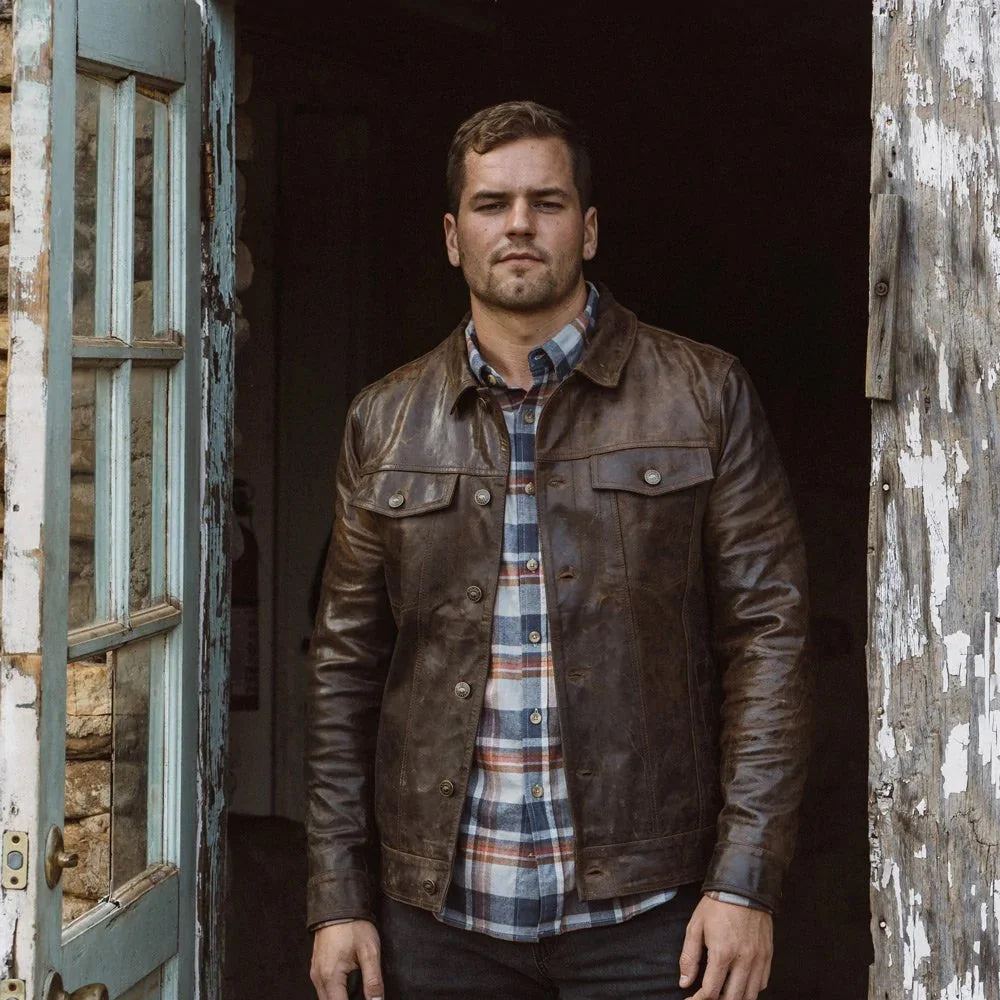Front fit of men’s Type III-inspired leather trucker jacket in brown