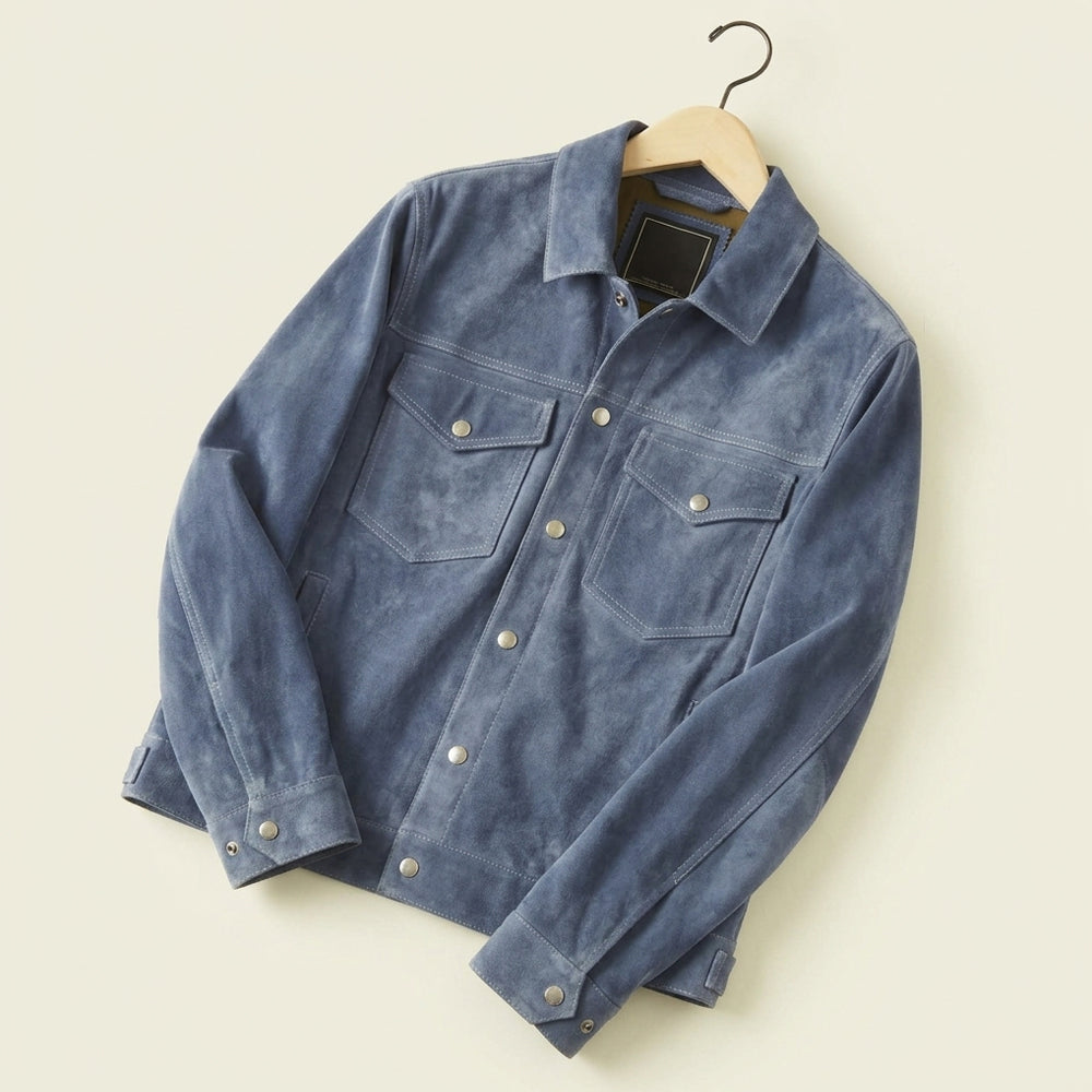 Angled view of men’s Type III suede jacket with pointed collar, snap cuffs and structured straight hem