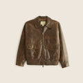 Front view of men’s vintage brown leather utility bomber with large snap-flap pockets and shirred waistband