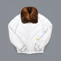 Men’s white calfskin V-bomber front with brown opossum-fur collar, chevron down panels, zipper and welt pockets