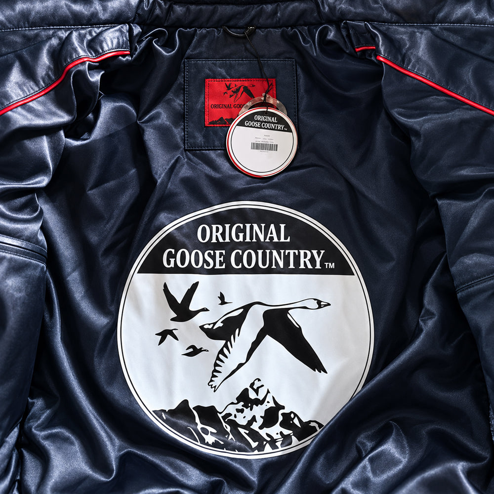 Original Goose Country tri-color V-Bomber interior with navy satin lining, circular goose emblem, red woven label and contrast piping.