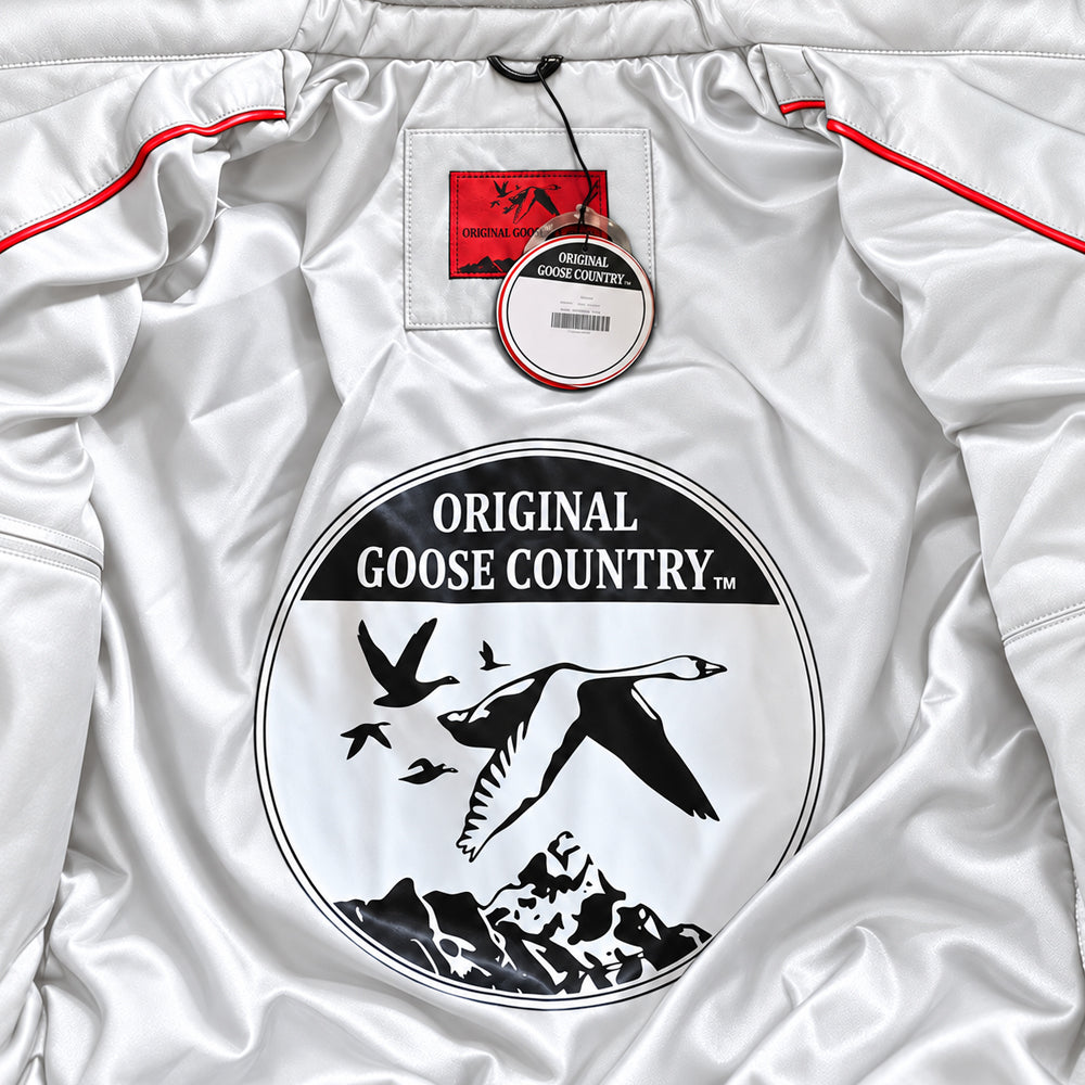Original Goose Country V-Bomber interior with white satin lining, circular goose artwork, red piping and branded neck label.
