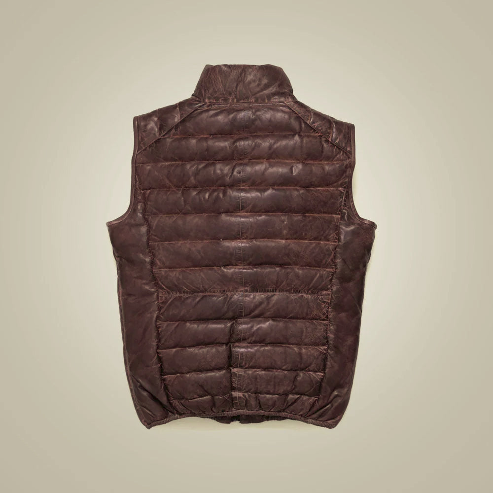 Rear view of quilted buffalo leather gilet showing symmetrical down channels, angled shoulder seams and center back line