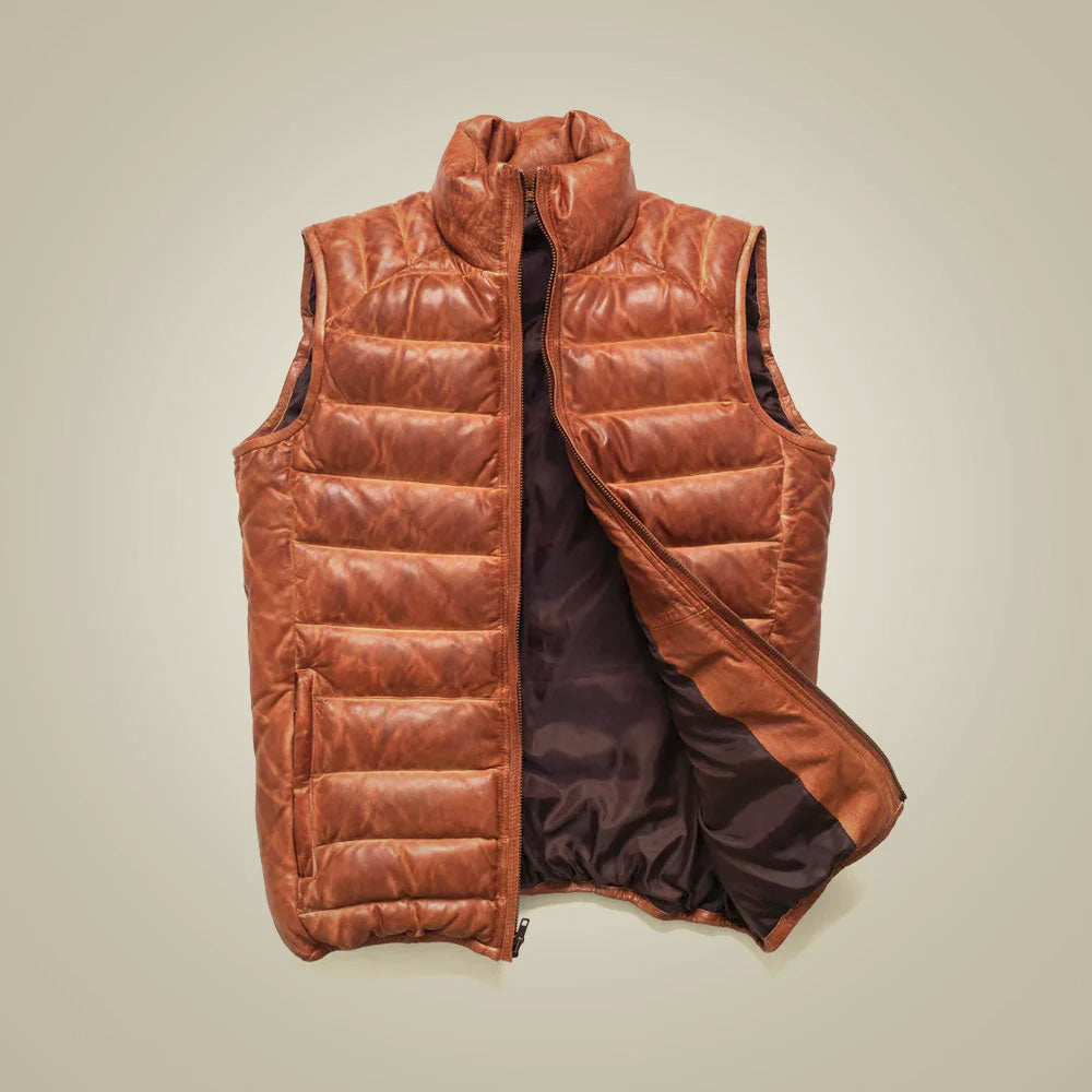 Open cognac quilted leather vest displaying smooth dark lining, full zipper and insulated stand collar
