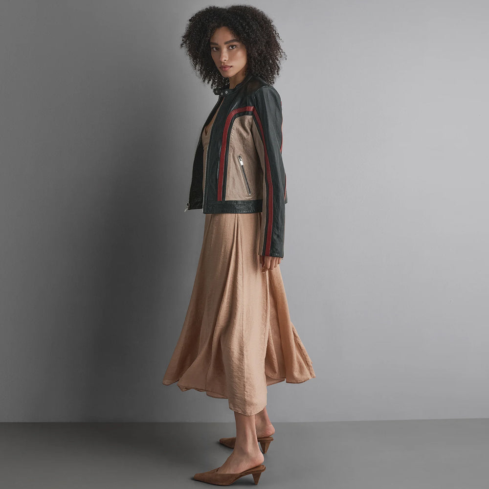 Side profile of short taupe and burgundy panel moto jacket with vertical zip pocket and straight black hem band