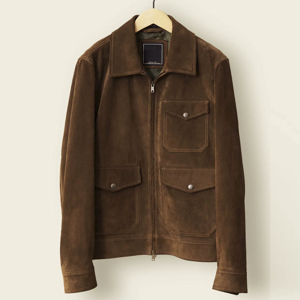 Front view of a men’s brown goatskin suede utility jacket with pointed collar, metal zip and snap-flap pockets