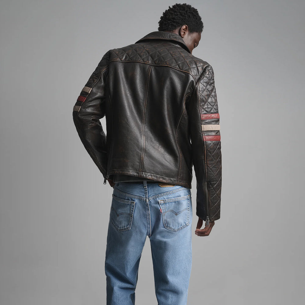 Rear view of vintage men’s moto jacket showing diamond-quilted shoulder yoke, center seam and burgundy cream arm bands