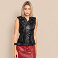 Front view of women’s belted black leather biker vest with notched snap lapels, diagonal zipper and two zip pockets