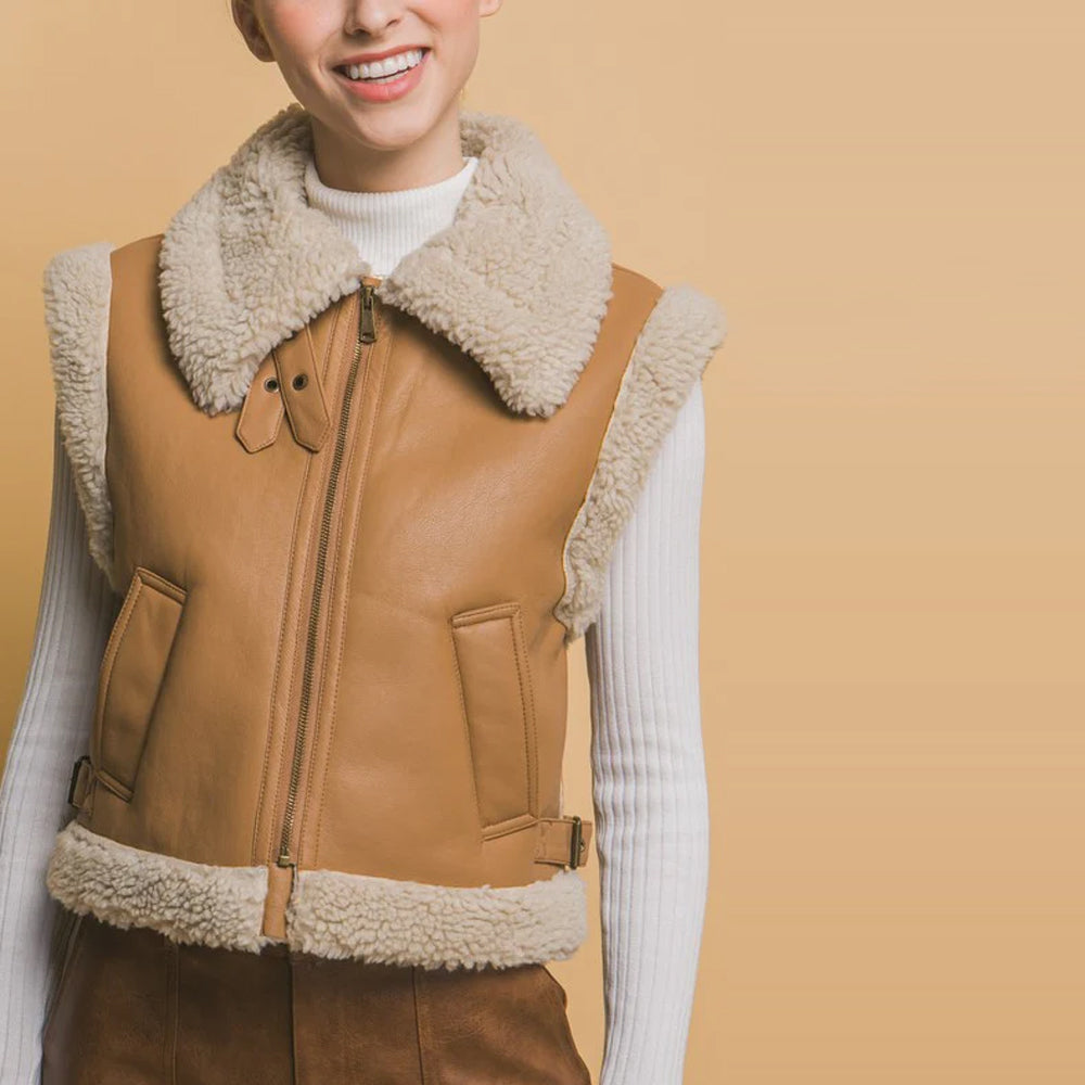 Close-up of shearling wool collar trim on women's sheepskin leather vest
