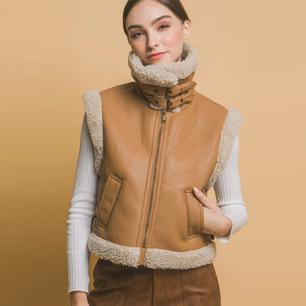 Women's shearling vest with convertible high collar and buckle straps