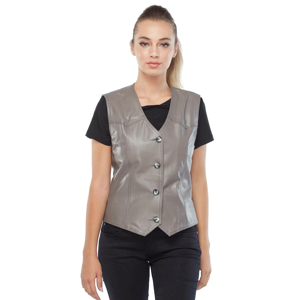 Front view of model wearing a slate grey lambskin leather vest with four buttons over a black shirt.